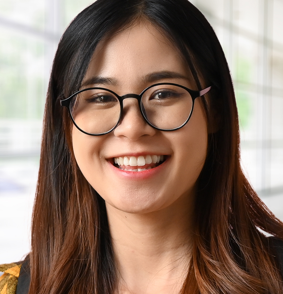 Portrait of a high school student wearing glasses